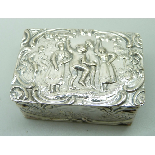 850 - A Dutch snuff box with a dancing scene, marked .800, 45g