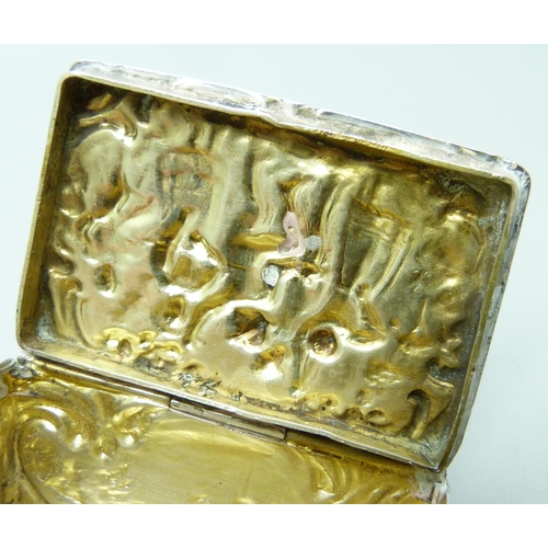 850 - A Dutch snuff box with a dancing scene, marked .800, 45g