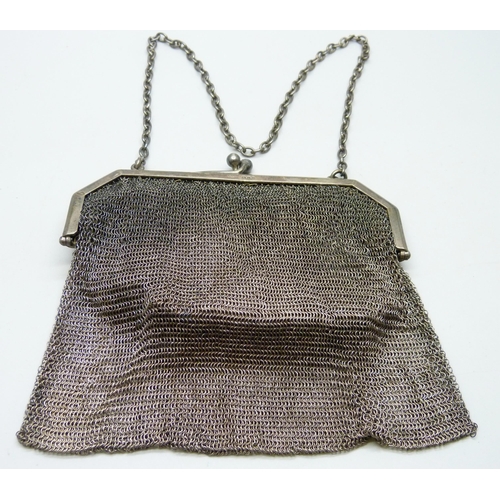 856 - A hallmarked silver mesh purse, 170g with liner