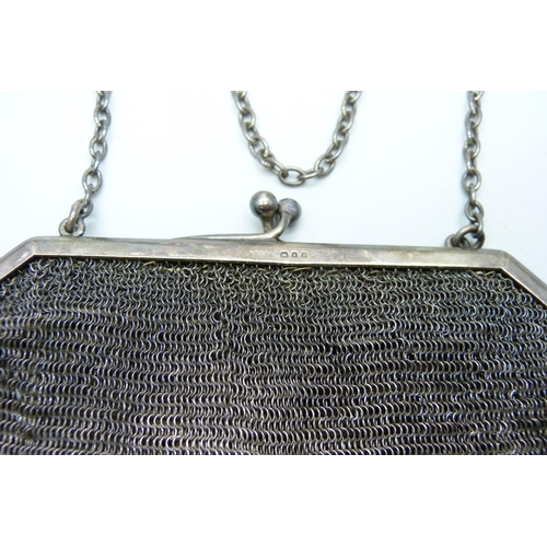 856 - A hallmarked silver mesh purse, 170g with liner