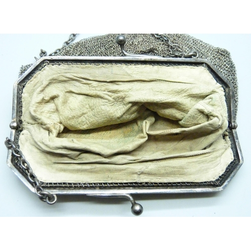 856 - A hallmarked silver mesh purse, 170g with liner