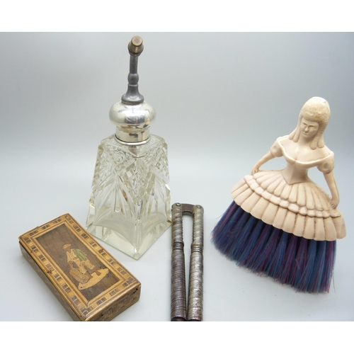 862 - A cutglass and silver topped perfume atomiser, a mosaic wooden box, a pair of nutcrackers, etc.