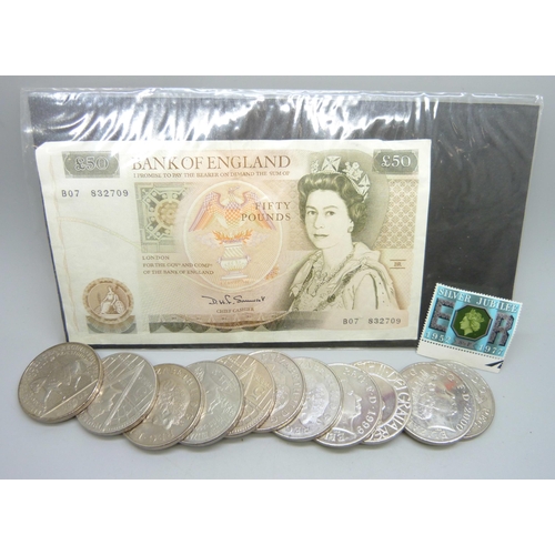 866 - A Bank of England £50 note, Somerset chief cashier, eleven £5 coins and a small collection of stamps