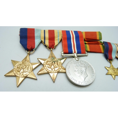 870 - A set of three WWII medals and miniatures to 185769 S.J. Windisch