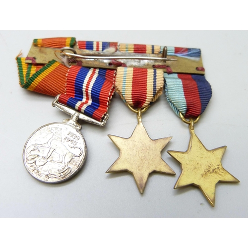 870 - A set of three WWII medals and miniatures to 185769 S.J. Windisch