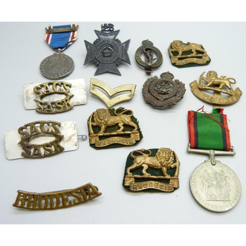 871 - Rhodesia military badges and two medals