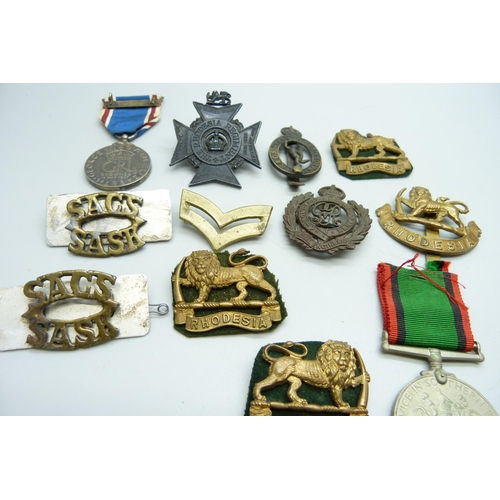 871 - Rhodesia military badges and two medals