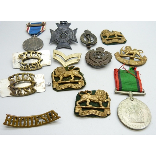 871 - Rhodesia military badges and two medals