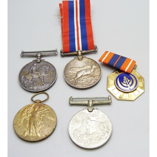 875 - Five assorted medals, WWI Victory medal to 2094 W.I. Morris RA, a WWI  British War medal to Sjt. N. ... 