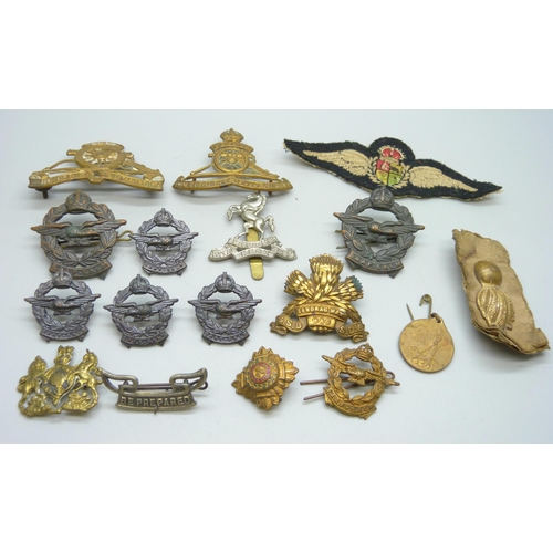 876 - Cap and other military badges, etc.