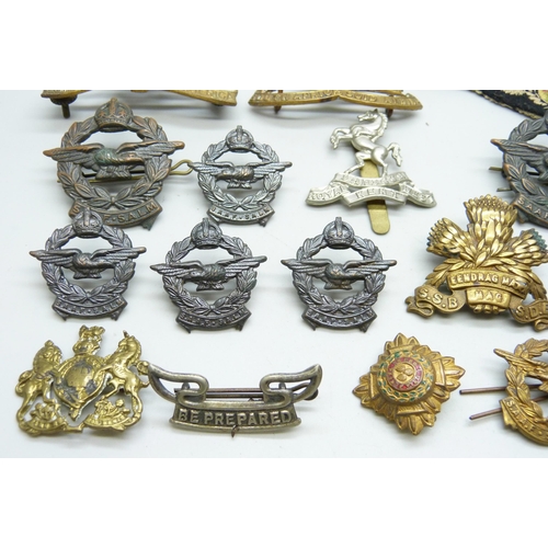 876 - Cap and other military badges, etc.