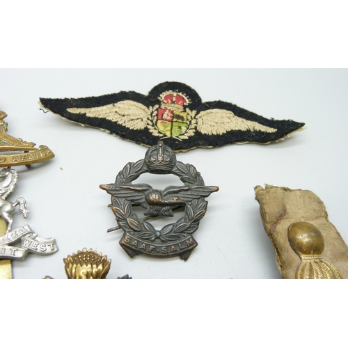 876 - Cap and other military badges, etc.