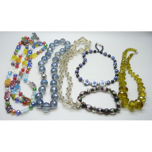 881 - A collection of glass bead necklets and bracelets