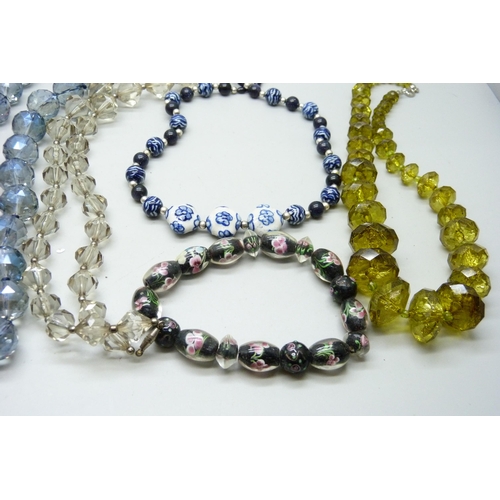 881 - A collection of glass bead necklets and bracelets