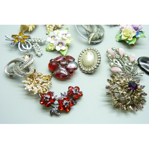 883 - Thirty costume brooches