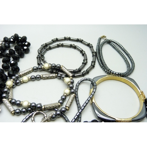 884 - A collection of French jet and hematite jewellery