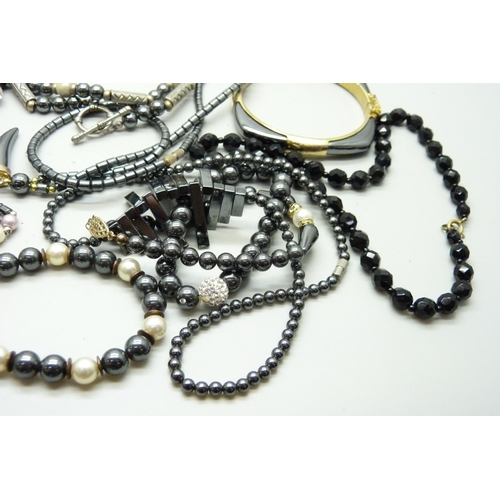 884 - A collection of French jet and hematite jewellery