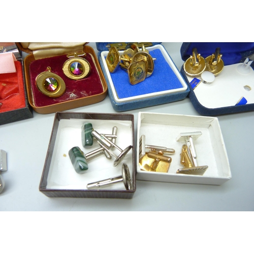 890 - A collection of cufflinks including R.A.F. and South African police