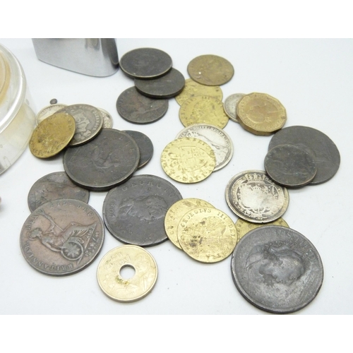 896 - Six silver coins, gaming tokens, a lighter, etc.