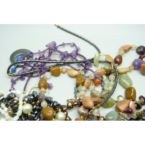 918 - A collection of gemstone jewellery including blue goldstone and amethyst