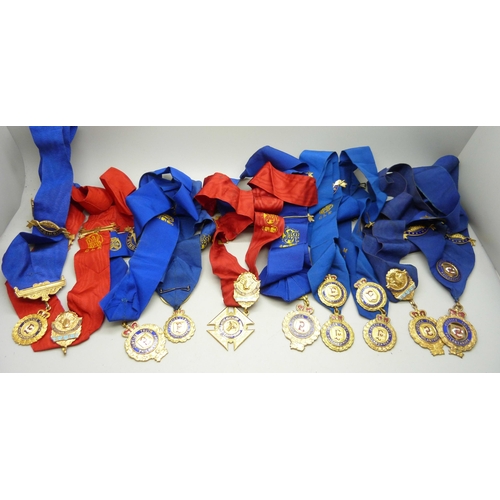 920 - A collection of lodge medals on ribbons