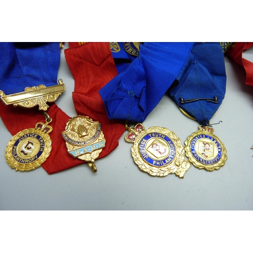 920 - A collection of lodge medals on ribbons