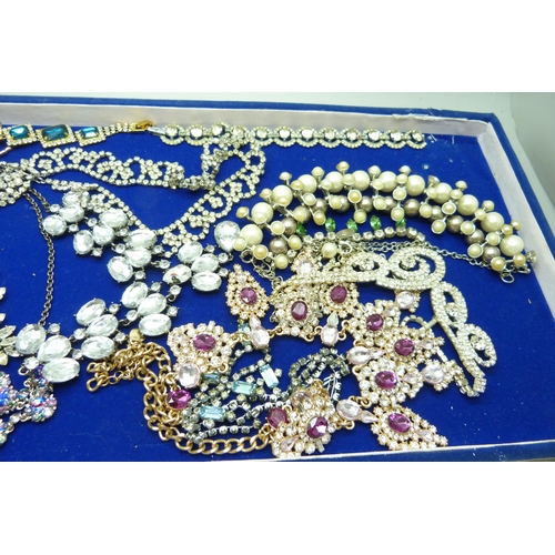 924 - A collection of vintage paste and pearl set jewellery