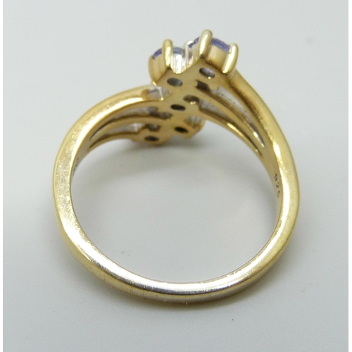 945 - A silver gilt and tanzanite ring, Q