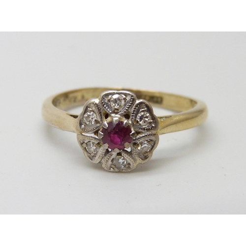 947 - An 18ct gold and platinum set Art Deco ruby and diamond cluster ring, 3.2g, P