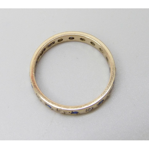 948 - A 9ct gold blue and white stone ring, 2.3g, P