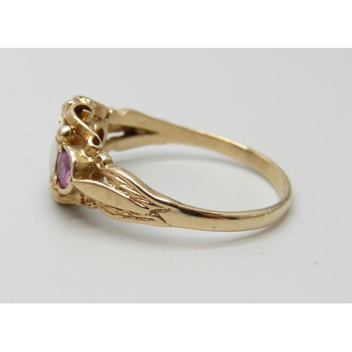 957 - A 9ct gold opal and amethyst ring, 2.9g, S