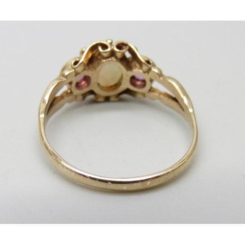 957 - A 9ct gold opal and amethyst ring, 2.9g, S