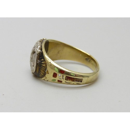 961 - A small Double Eagle Masonic ring, enamelled and set with a diamond, tests as 14k gold, 3.8g, F