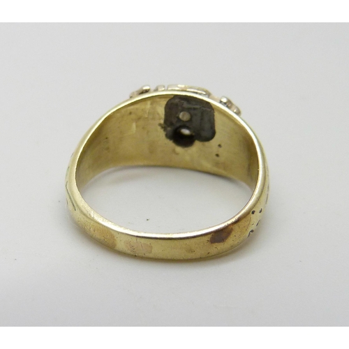 961 - A small Double Eagle Masonic ring, enamelled and set with a diamond, tests as 14k gold, 3.8g, F