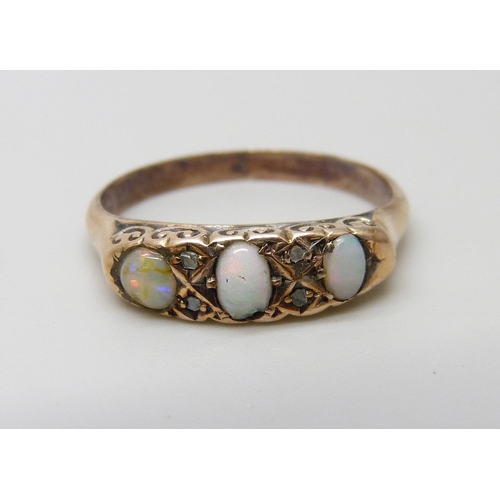 962 - An Edwardian 9ct gold opal and diamond ring, Birmingham 1908, 1.4g, P