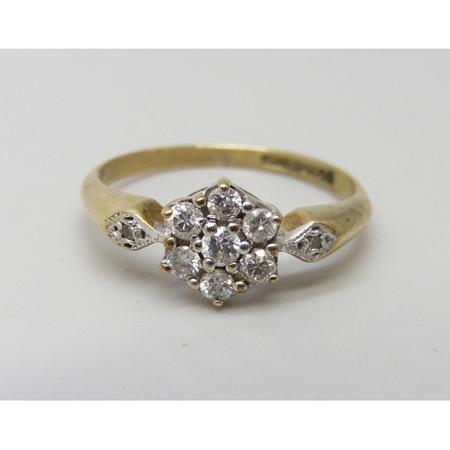 965 - A 9ct gold and diamond cluster ring with diamond shoulders, 1.6g, L