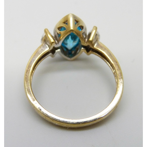 970 - A silver gilt marquise blue and white gem set ring, Q