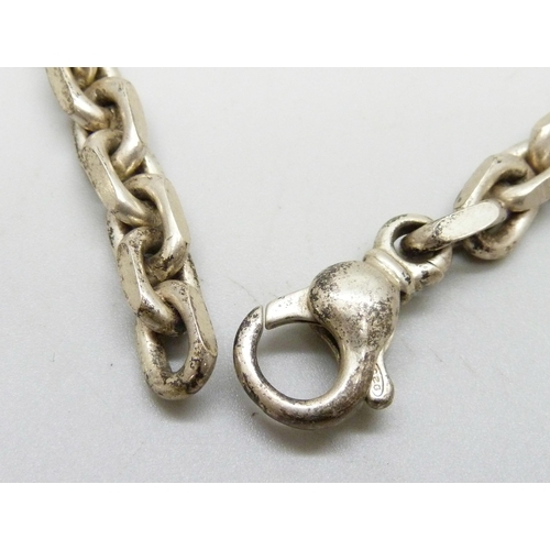 979 - A silver necklace, 85g, 49cm