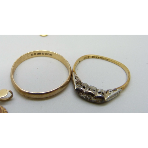 981 - An 18ct gold and platinum ring, 1.9g, a/f, a 9ct gold ring, 1.5g, and a 9ct gold heart shaped cameo ... 