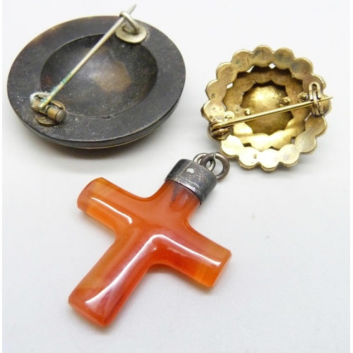 996 - A Bohemian garnet brooch, a tortoiseshell pique brooch and a cross pendant