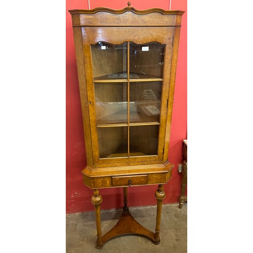 114 - A Queen Anne style walnut and burr walnut freestanding corner cabinet