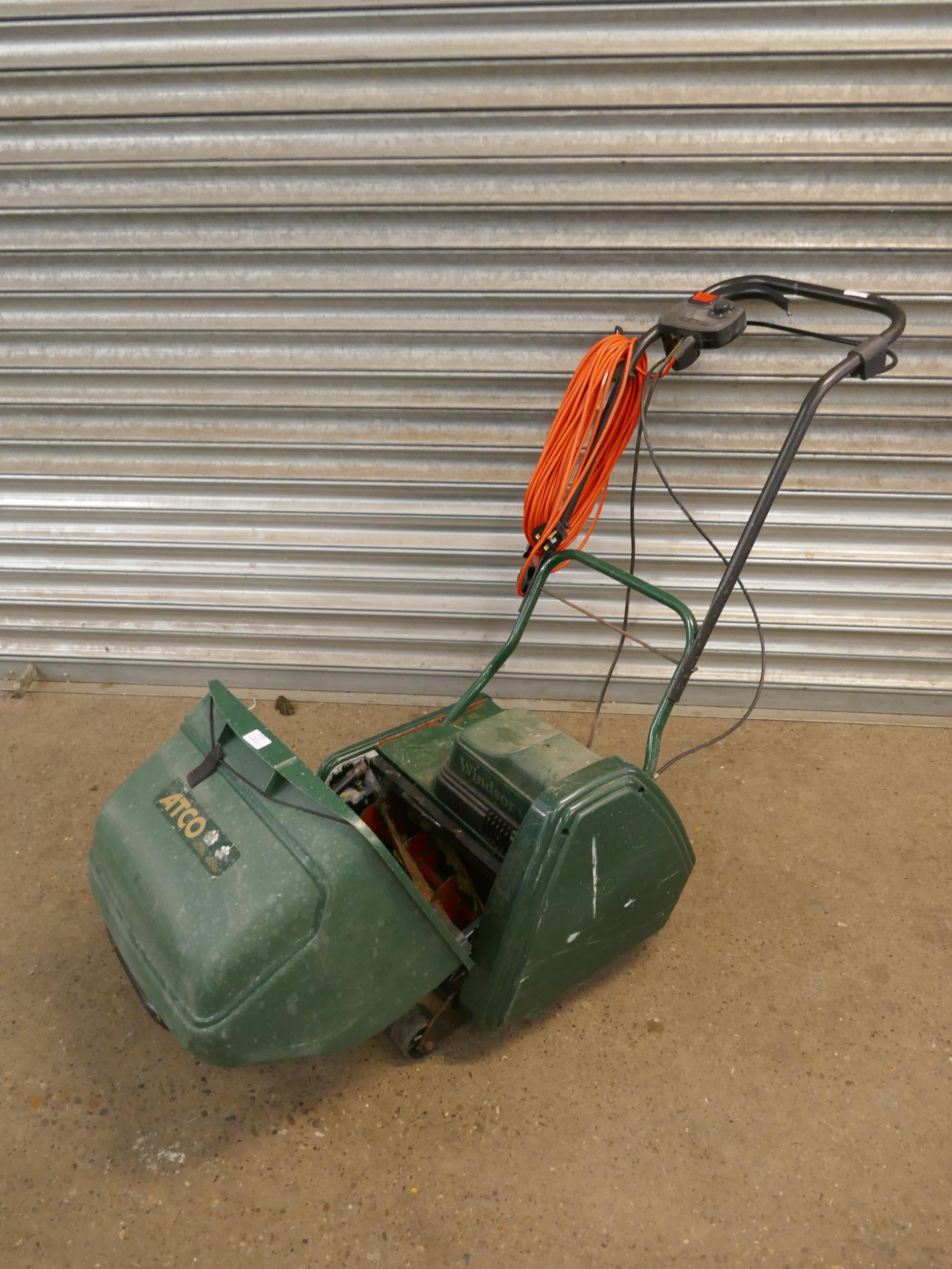 An ATCO Windsor 14s electric cylinder lawn mower with grass box