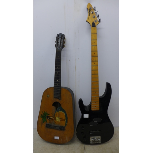 2109 - An Aria Pro II Magna series left handed bass guitar and a Hawaiian style acoustic guitar