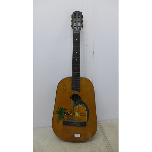 2109 - An Aria Pro II Magna series left handed bass guitar and a Hawaiian style acoustic guitar