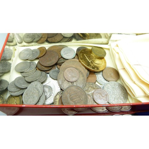 906 - A collection of British coins, including commemorative crowns, two pre 1920 coins, 19g, 1920 to 1946... 