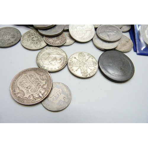 906 - A collection of British coins, including commemorative crowns, two pre 1920 coins, 19g, 1920 to 1946... 