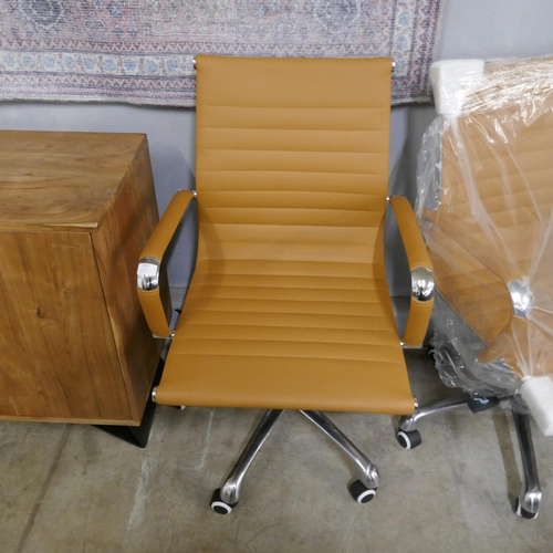 1351 - A tan and chrome Eames style desk chair