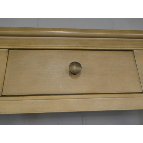 1402 - A wood effect three drawer console table