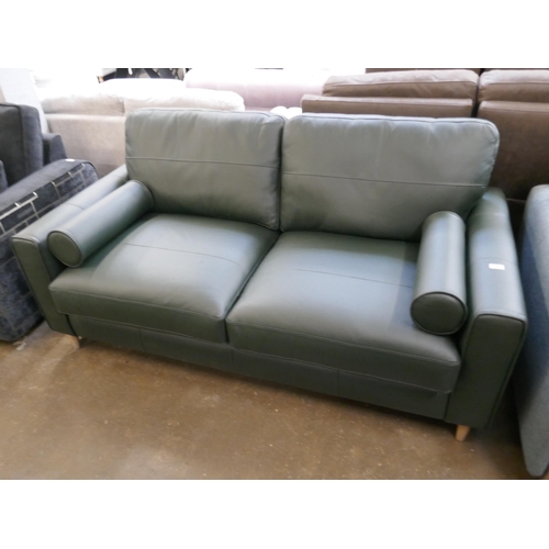 1414 - A green leather three seater sofa