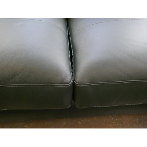 1414 - A green leather three seater sofa